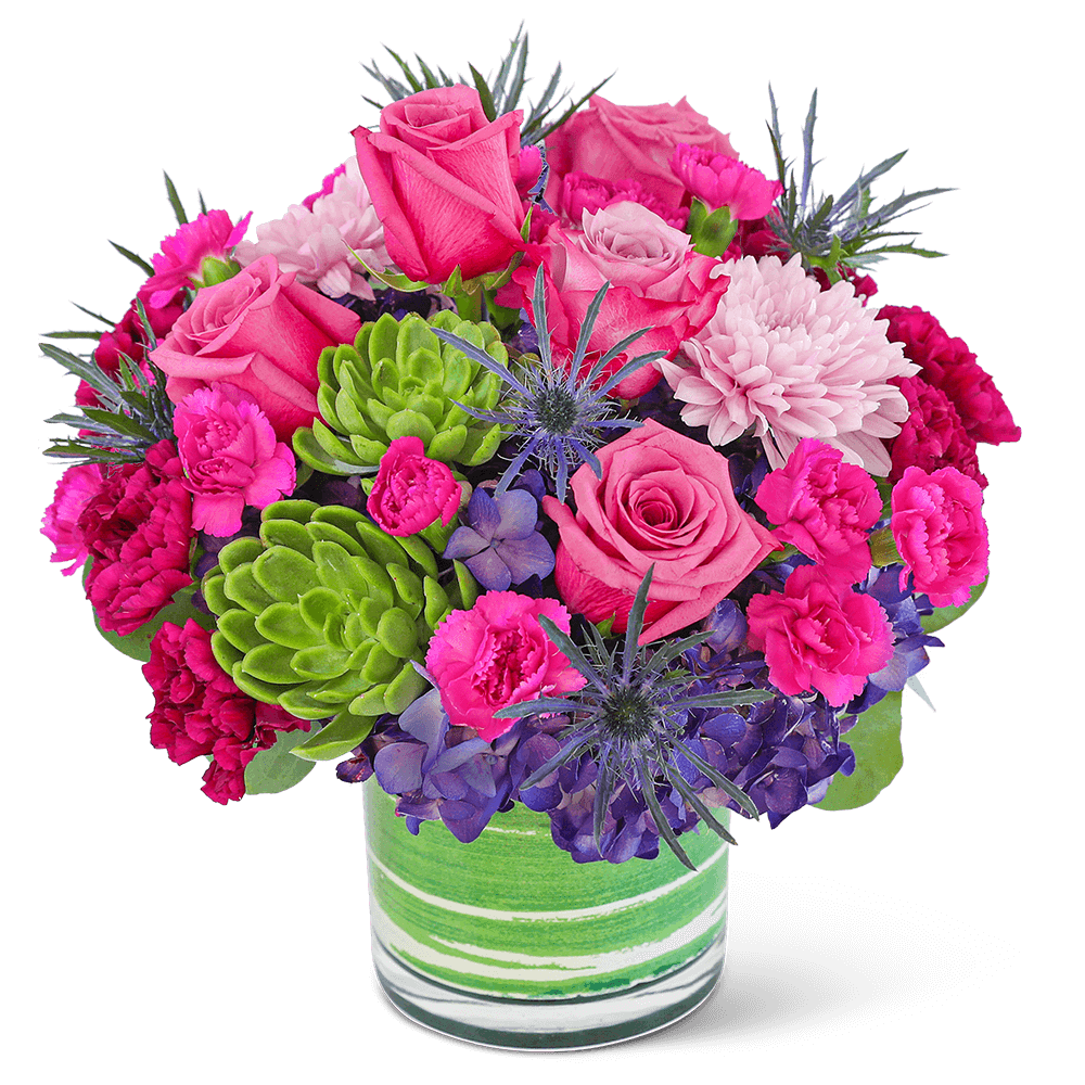 Delight in the rich purple tones of one of our floral favorites, London Luxe with Succulents. A chic, leaf-lined vase with hydrangea, roses, carnations, succulents, and premium foliage makes up this lavish floral design. This vibrant flower arrangement will brighten anyone's day and add a pop of color to any space. It would make a perfect Anniversary or Birthday gift for that special someone.