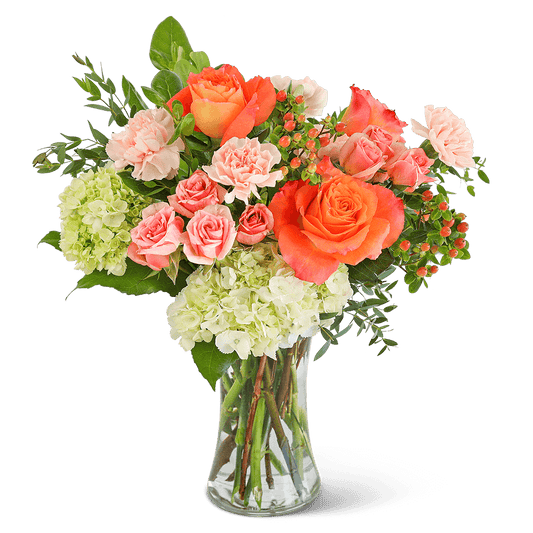 Send a message of love and hope with this beautiful flower arrangement. Brighten someone's day with the Malibu Sun flower design. Its highlighted flowers include Free Spirit Roses, carnations, hydrangea, spray roses, and assorted foliage. A stunning arrangement of fresh flowers is designed to brighten the room and lift the spirit, making someone’s birthday or get-well gift extra special.