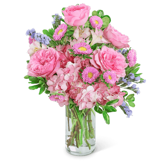Send your love with this beautiful design, perfect for a birthday, new baby, or romantic gift. Head in the Clouds features pink roses, Alstroemeria, and Hydrangea designed in a clear vase for a delicate look that will make anyone smile. This unique flower design adds the perfect extra pop of pastel color!